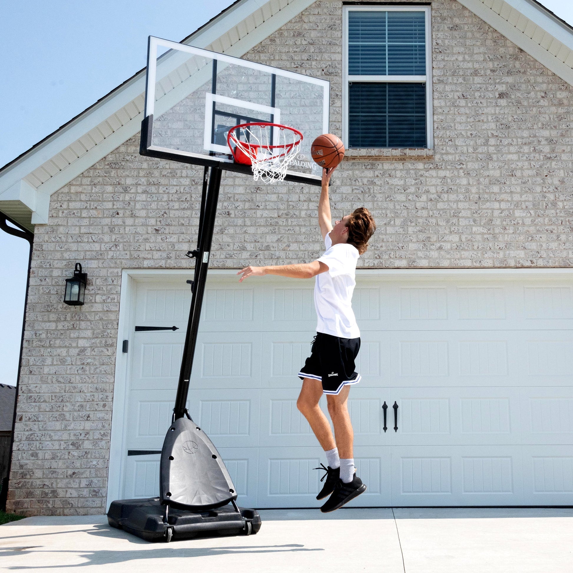 54-Inch Portable Basketball Hoop with Shatter-Proof Polycarbonate Backboard, Adjustable Exactaheight System & Pro Slam Rim-Outdoor Play
